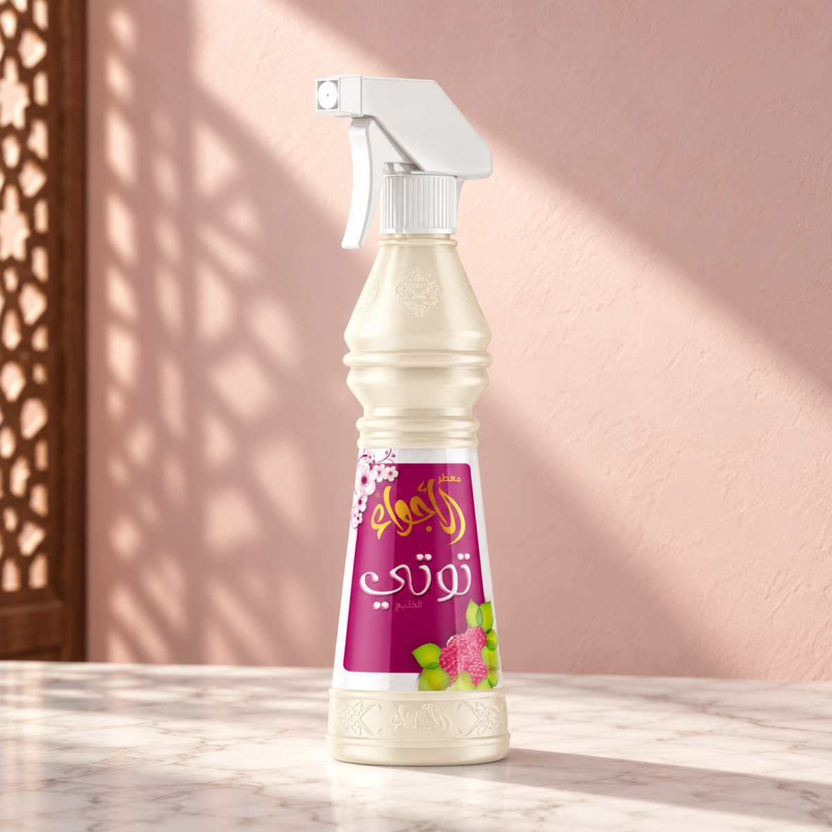Tooty Air Freshener 500 ml from Sedr Al-Khaleej; spray bottle with a white trigger and pink label on marble against a pink sunlit wall.