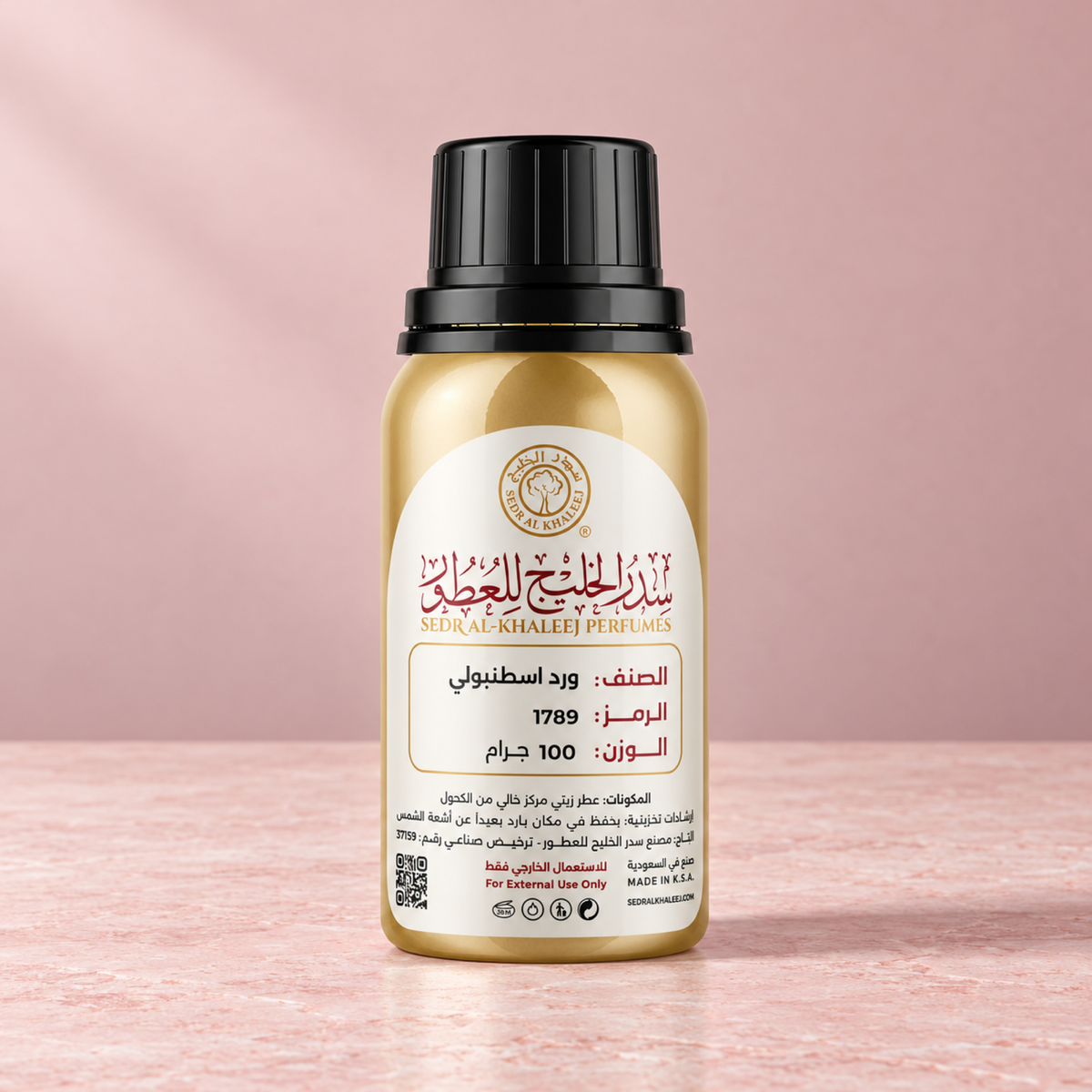 Sedr Al-Khaleej istanbul rose perfume oil; one closed original bottle on pale pink limestone before a dusty blush pink backdrop.