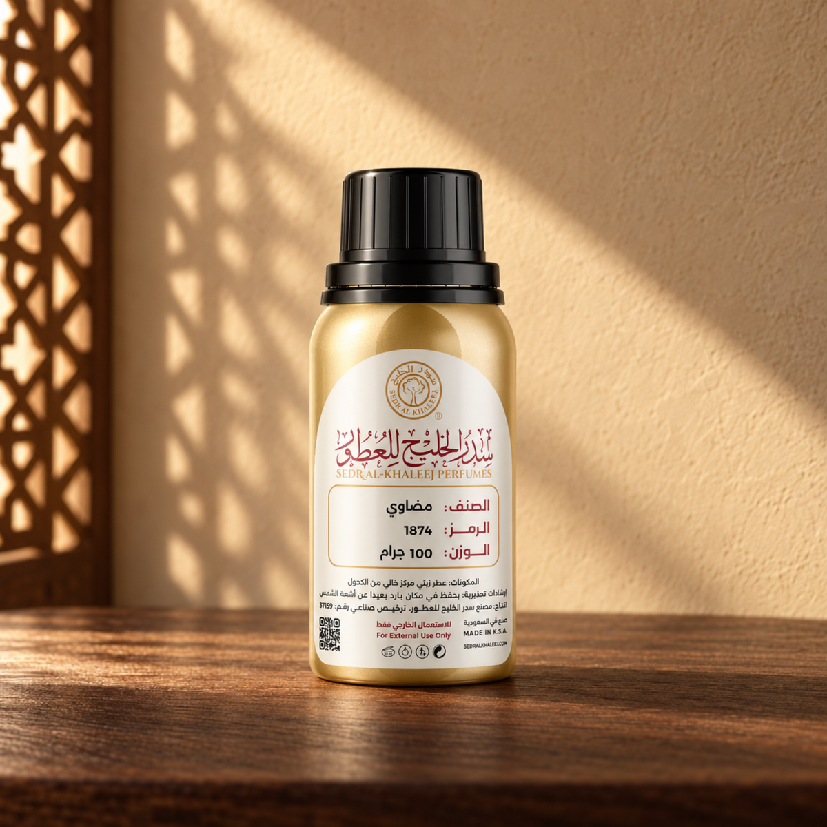 Sedr Al-Khaleej Madawi Perfume Oil bottle on a walnut surface in warm sunlight