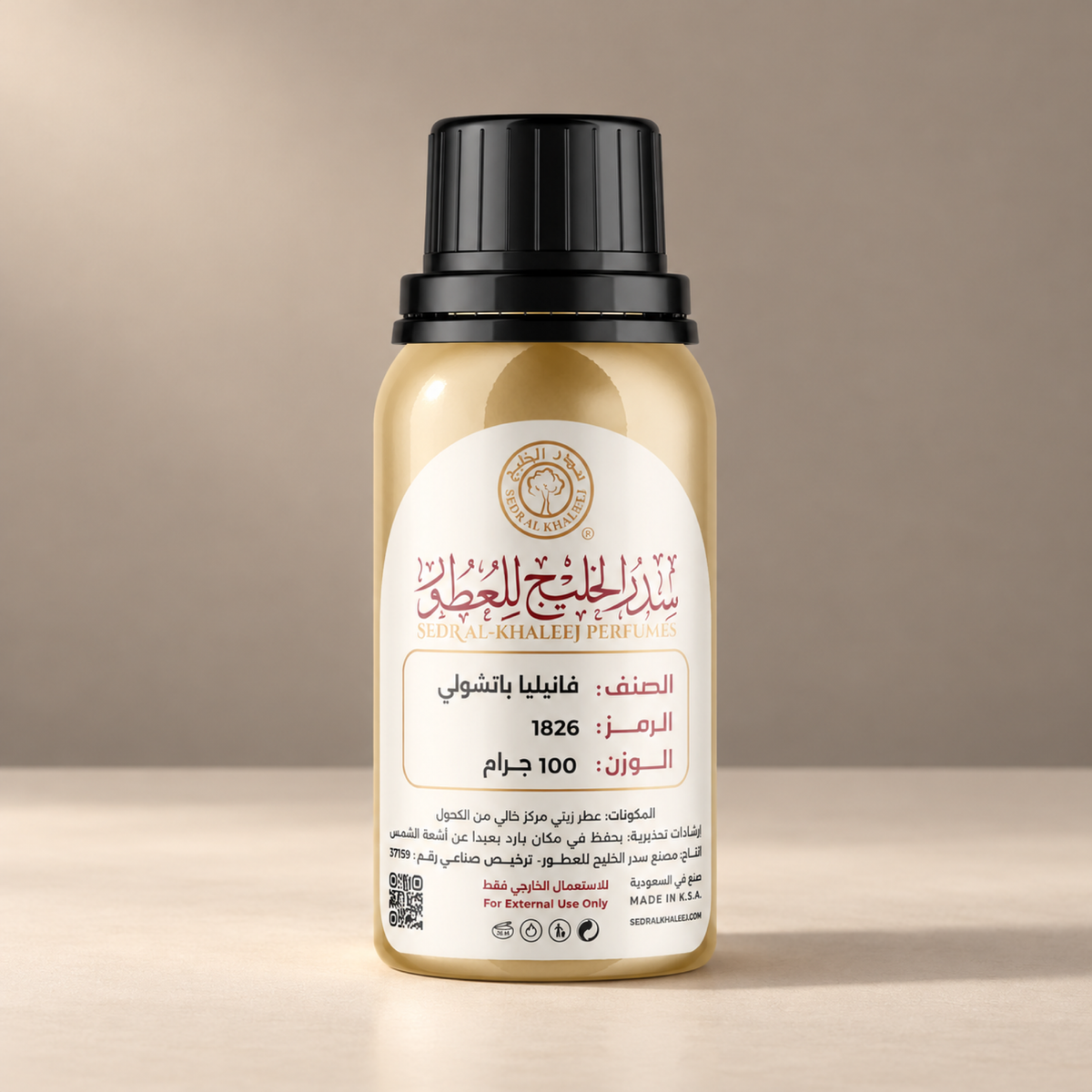Sedr Al-Khaleej patchouli vanilla perfume oil; one closed original bottle on matte cream porcelain before a soft latte, mushroom taupe backdrop.