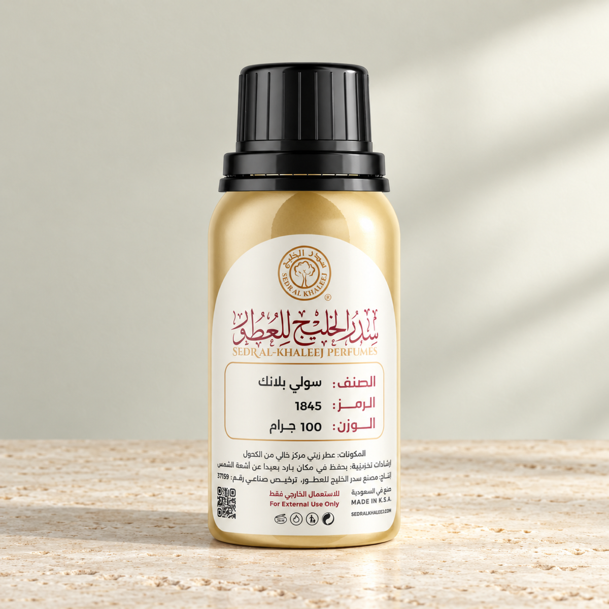Sedr Al-Khaleej soleil blanc perfume oil; one closed original bottle on pale cream travertine before a coconut ivory, pale pistachio grey backdrop.