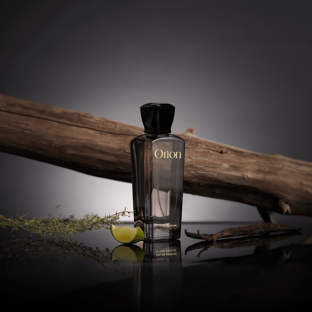 Orion perfume bottle on a wooden log